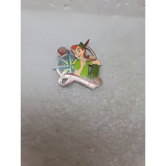 Disney Other - Disney Film Characters Peter Pan with Pan Pipes & Compass Never Grow Up Pin